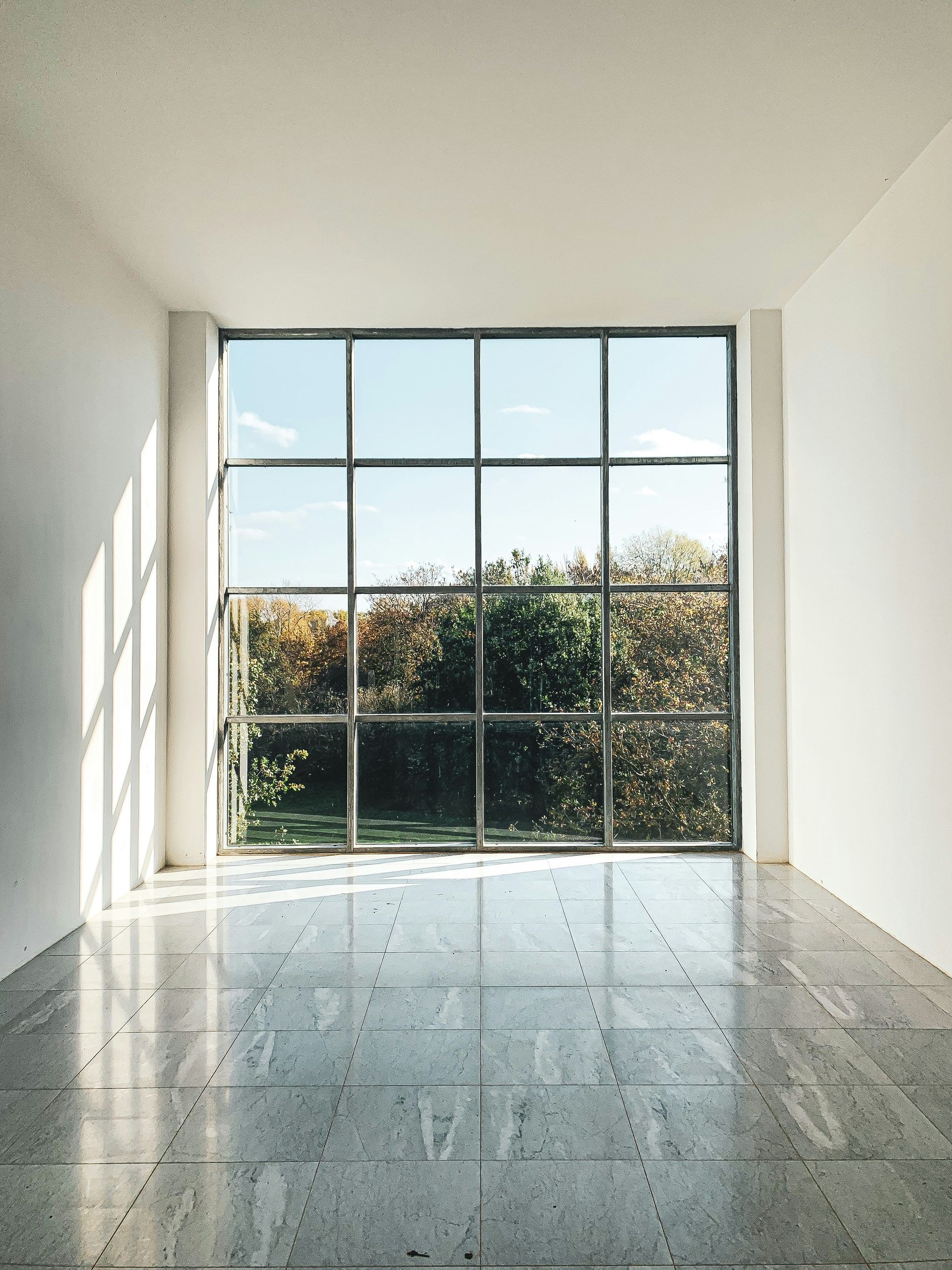 white framed glass window during daytime